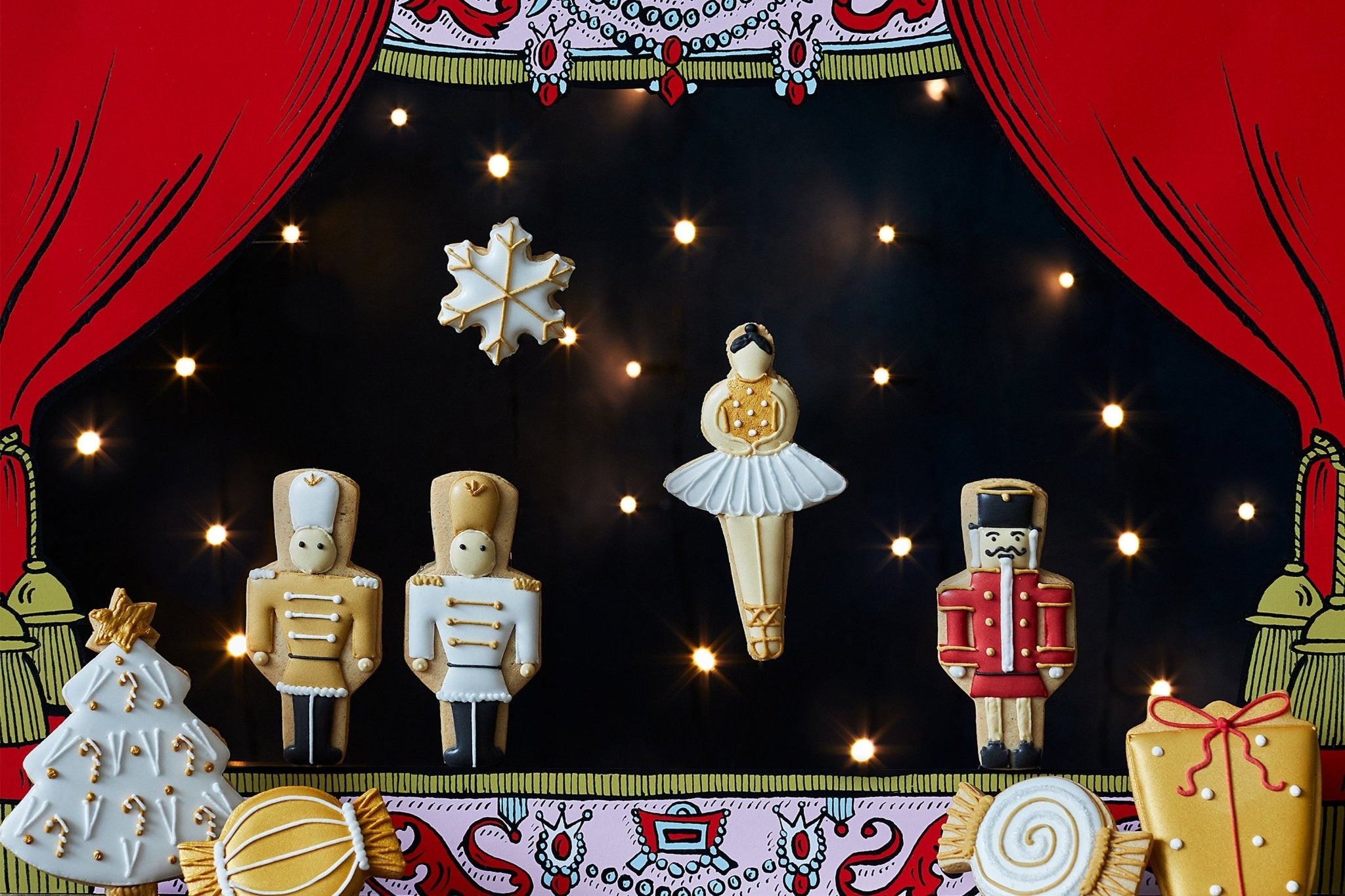 Nutcracker-themed biscuits by Biscuiteers: soldier and ballerina shapes, perfect for Christmas and personalized gifts.