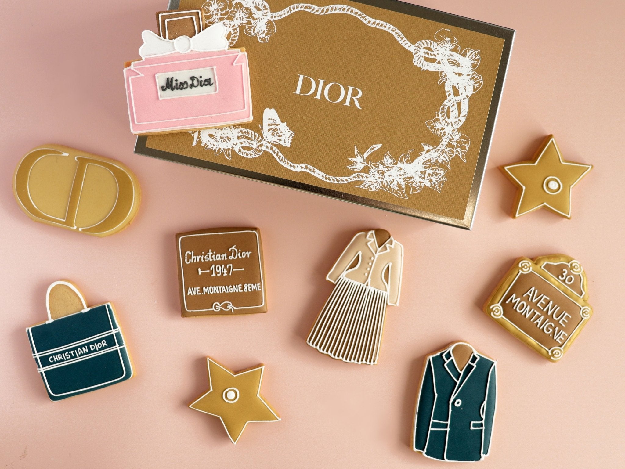 Harrods Christmas Dior display with Biscuiteers' hand-iced biscuits, perfect for festive gifting and personalized treats.