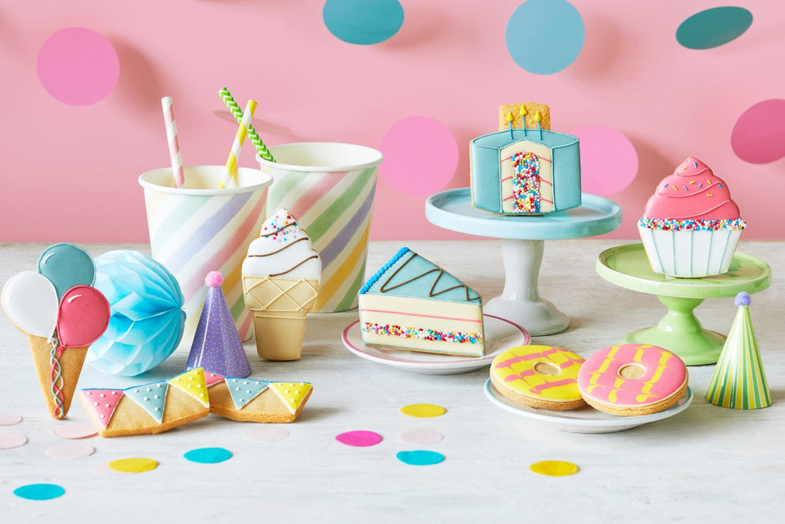 Biscuiteers Happy Birthday treats: hand-iced biscuits, perfect for last-minute, personalised gifts with next day delivery.