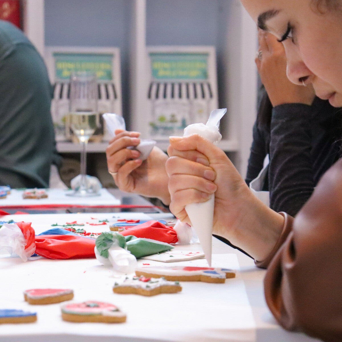 Corporate Xmas Events Plp hand-iced biscuits, perfect personalised gift for holiday celebrations, festive biscuit tin gift.