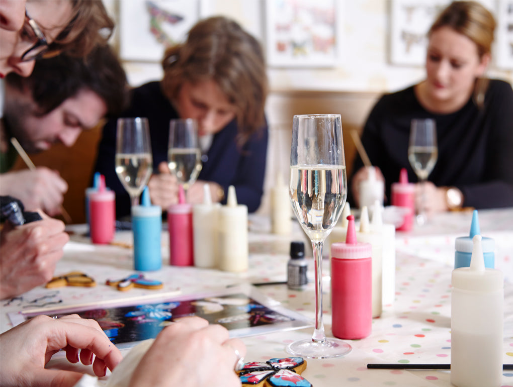 Hand-iced biscuits in a decorative tin, perfect personalised birthday gift or biscuit tin gift from Biscuiteers.
