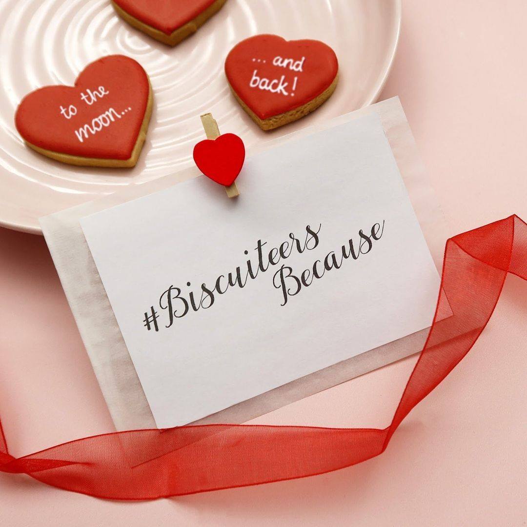 Valentine's Day Biscuiteers gift box with personalized heart-shaped biscuits, perfect for expressing love and gratitude.