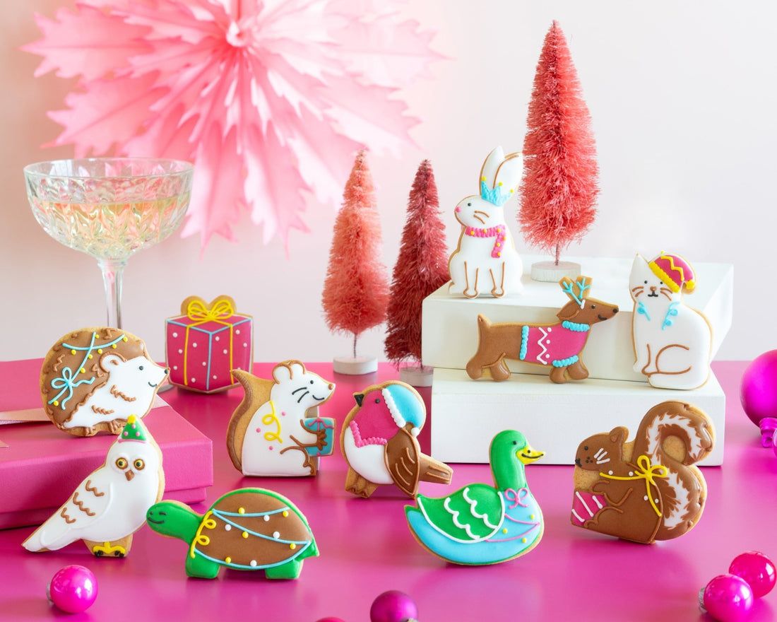 Party animal biscuits by Biscuiteers: festive, hand-iced treats perfect for Christmas gifts and personalized celebrations.