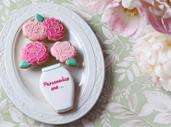 Hand-iced biscuits for friends, perfect for gifting; personalized treats by Biscuiteers for heartfelt occasions.