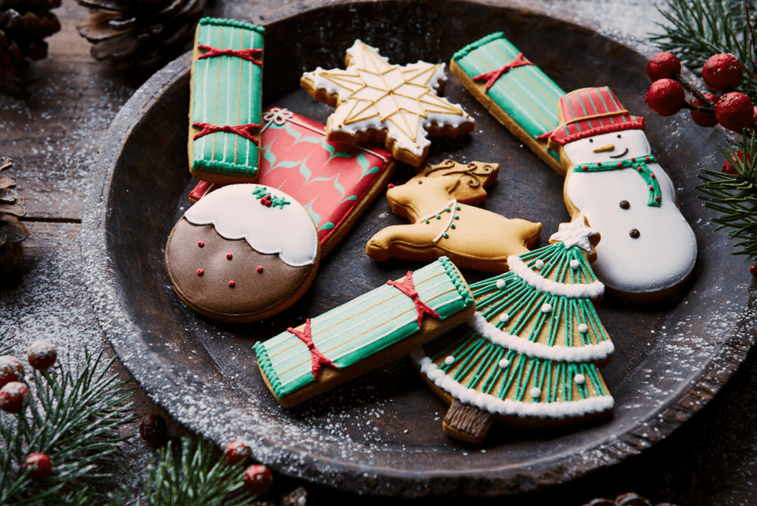 Our Happy Christmas Tin Through The Years - Biscuiteers