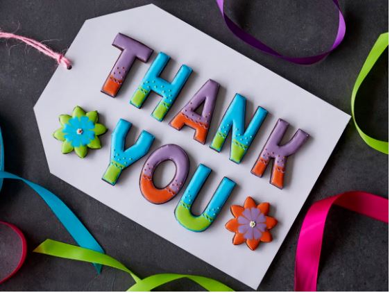 Hand-iced thank you biscuits by Biscuiteers, perfect for personalized gifts and heartfelt gratitude this season.