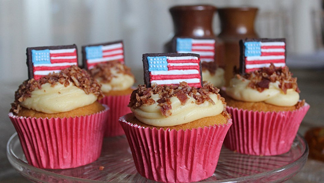 Thanksgiving cupcakes: maple buttercream with bacon sprinkles - Biscuiteers