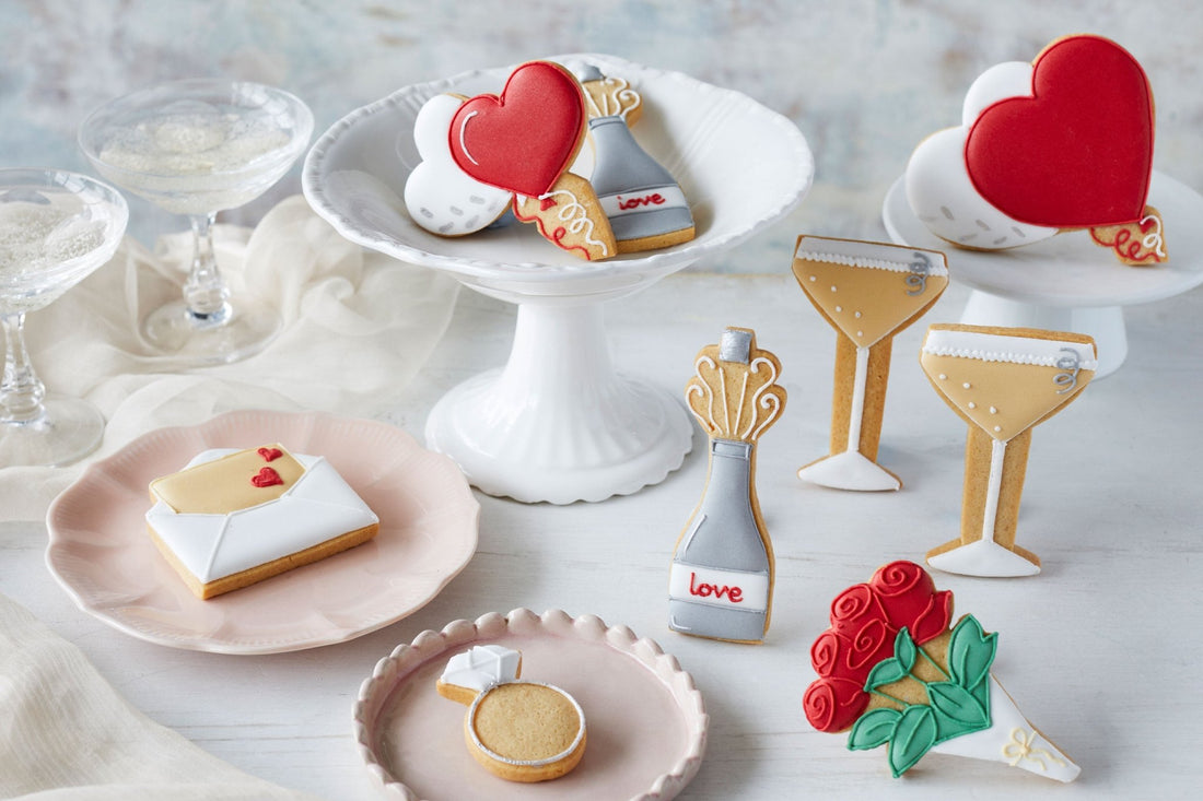 Engagement gift box with hand-iced lemon biscuits and prosecco by Biscuiteers, perfect for a unique, personalized celebration.