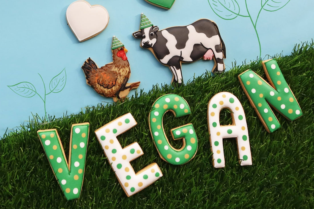 Hand-iced vegan biscuits by Biscuiteers, perfect for gifting on birthdays, Eid, or any occasion; personalized and delicious.