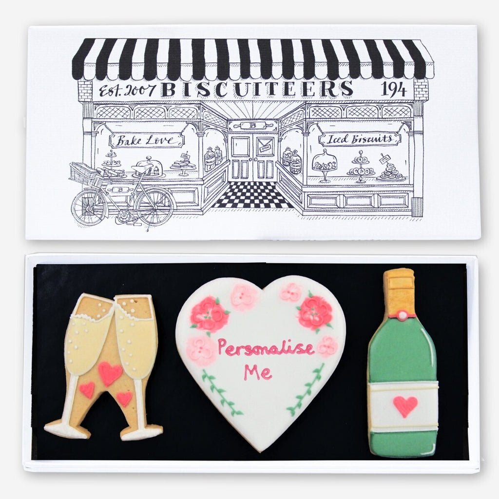 Hand-iced Wedding Mini Gift Box biscuits, perfect personalised gift for newlyweds, in a charming biscuit tin.