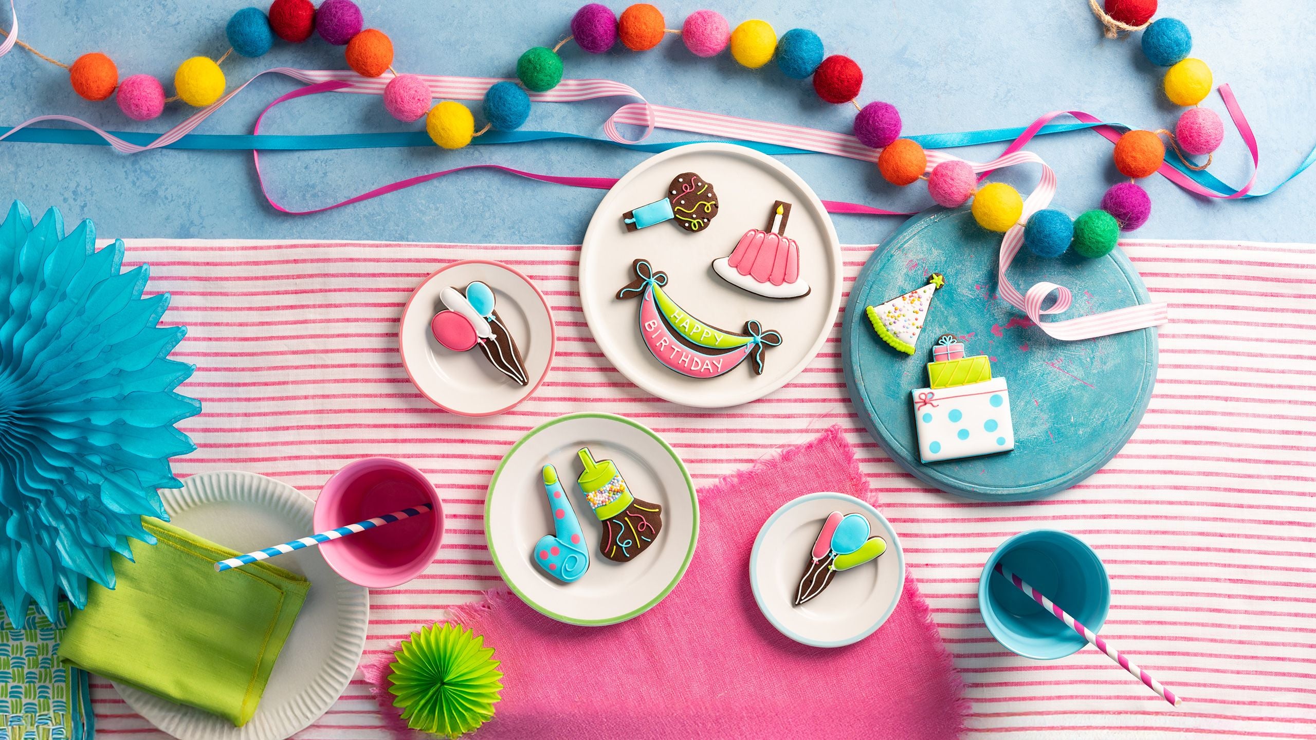 Colourful birthday biscuit gifts with party decorations
