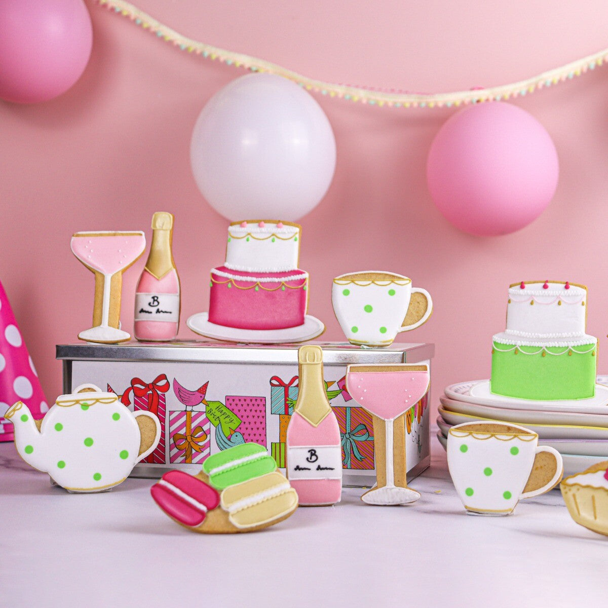 Hand-iced biscuits in Afternoon Tea Birthday Luxe Tin, perfect personalised birthday gift, elegant biscuit tin for celebrations.