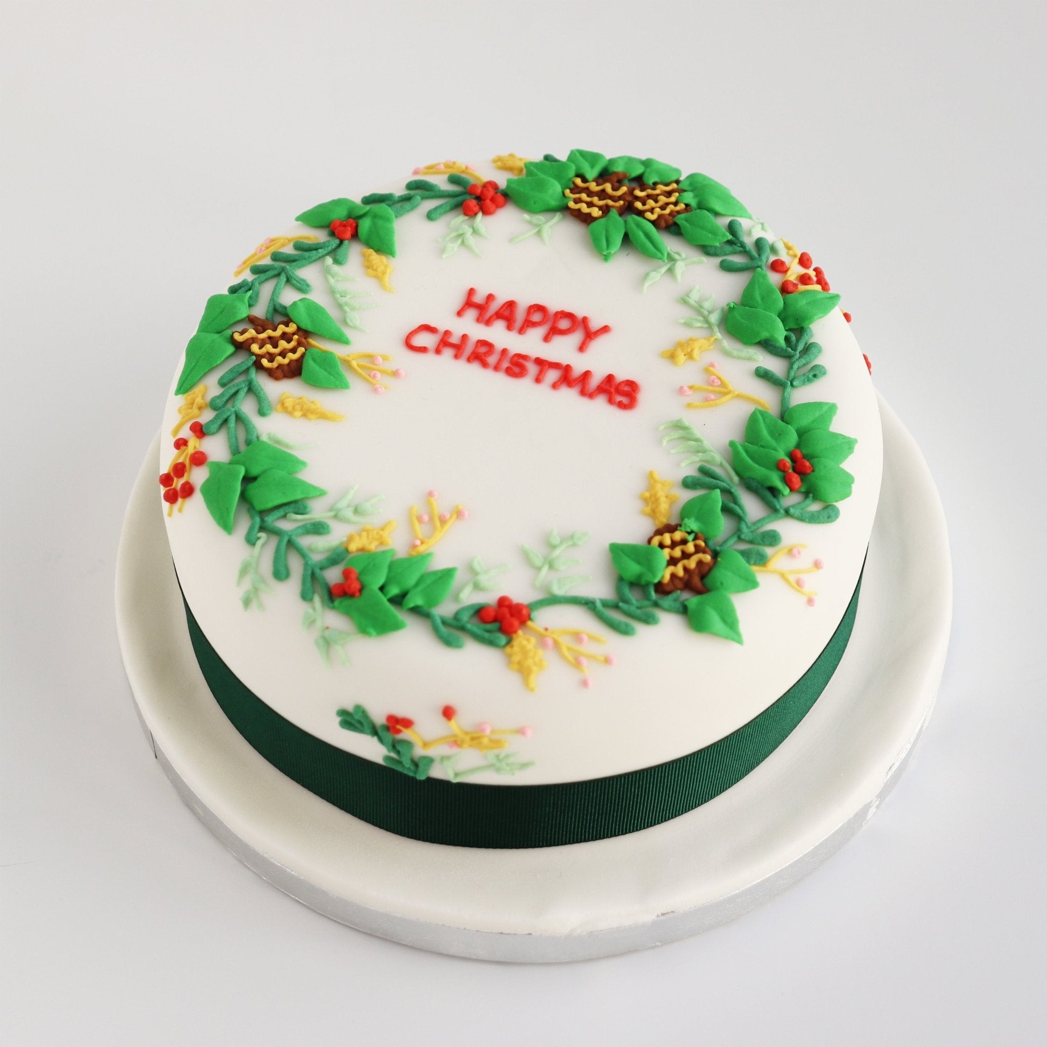 Christmas Holly Cake | cakes | Biscuiteers