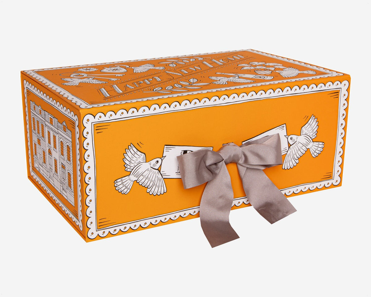 New Home Luxury Gift Box with hand-iced biscuits, perfect personalised gift for new homeowners, in a decorative biscuit tin.