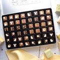 Giant Tin Personalised New Baby Chocolates - Biscuiteers
