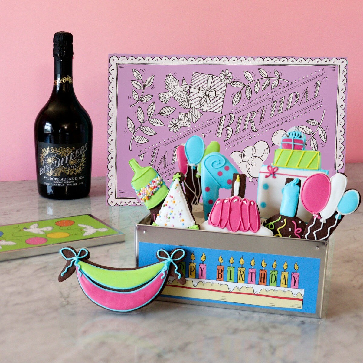 Hand-iced Happy Birthday Prosecco Gift Box with personalized biscuits, perfect birthday gift for prosecco lovers.
