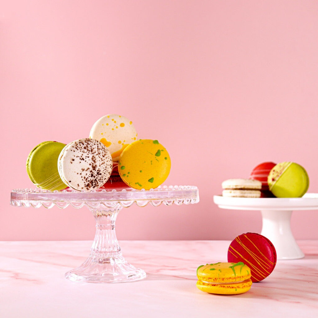 Hand-iced 6 Spring Macarons in a decorative tin, perfect personalised gift or birthday treat from Biscuiteers.
