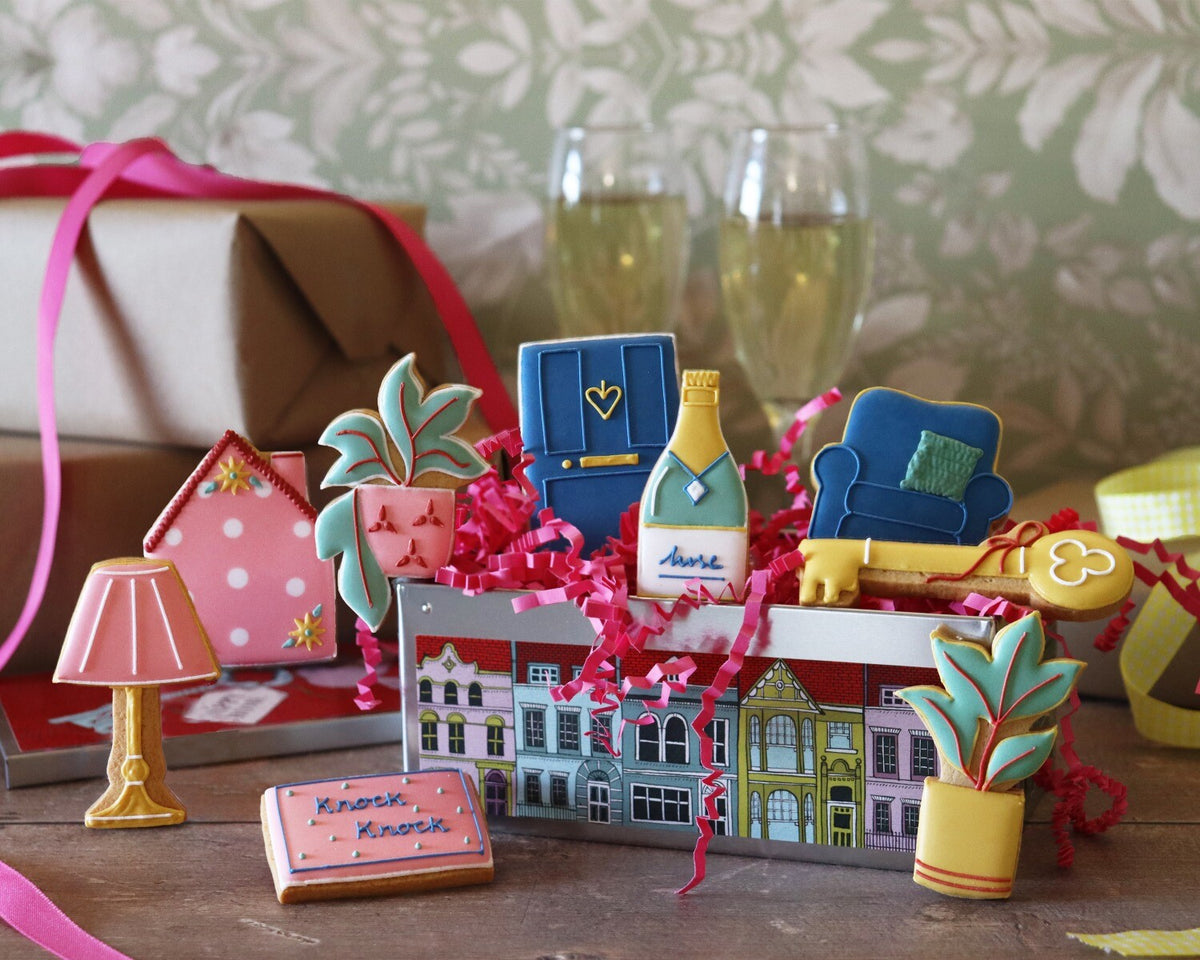 New Home Luxury Gift Box with hand-iced biscuits, perfect personalised gift for new homeowners, beautifully presented in a biscuit tin.
