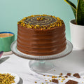 Patisserie Valerie Dubai Chocolate Cake - Biscuiteers