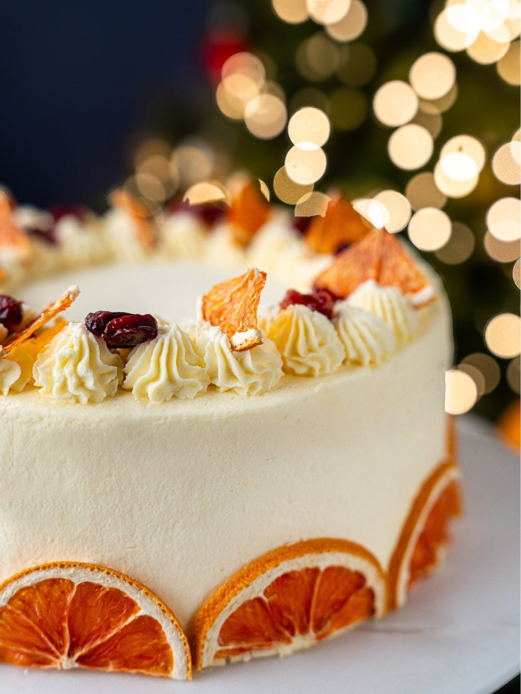 Patisserie Valerie Luxury Clementine & Cranberry Celebration Cake - Biscuiteers
