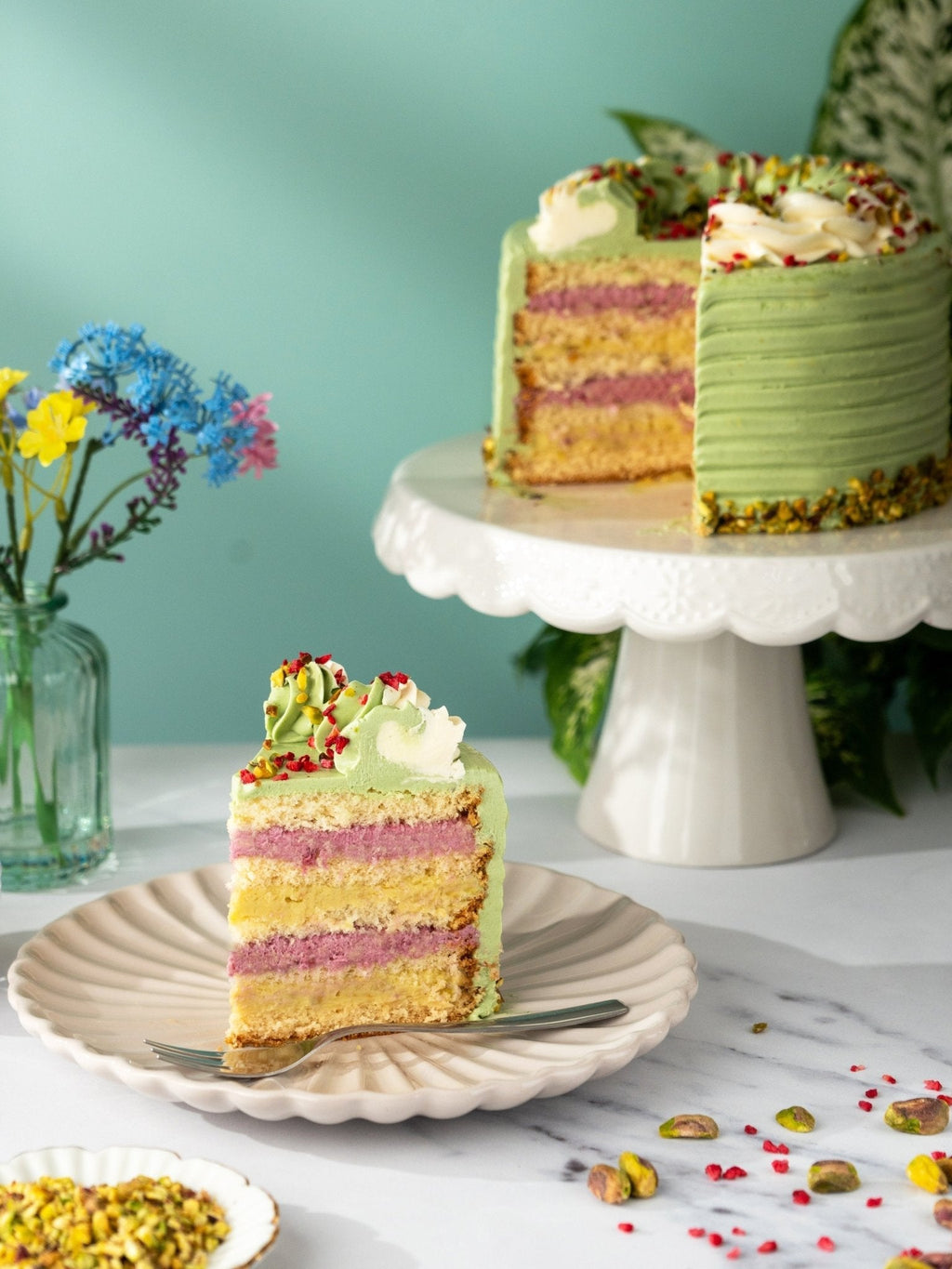Patisserie Valerie Pistachio and Raspberry Delight Cake - Biscuiteers