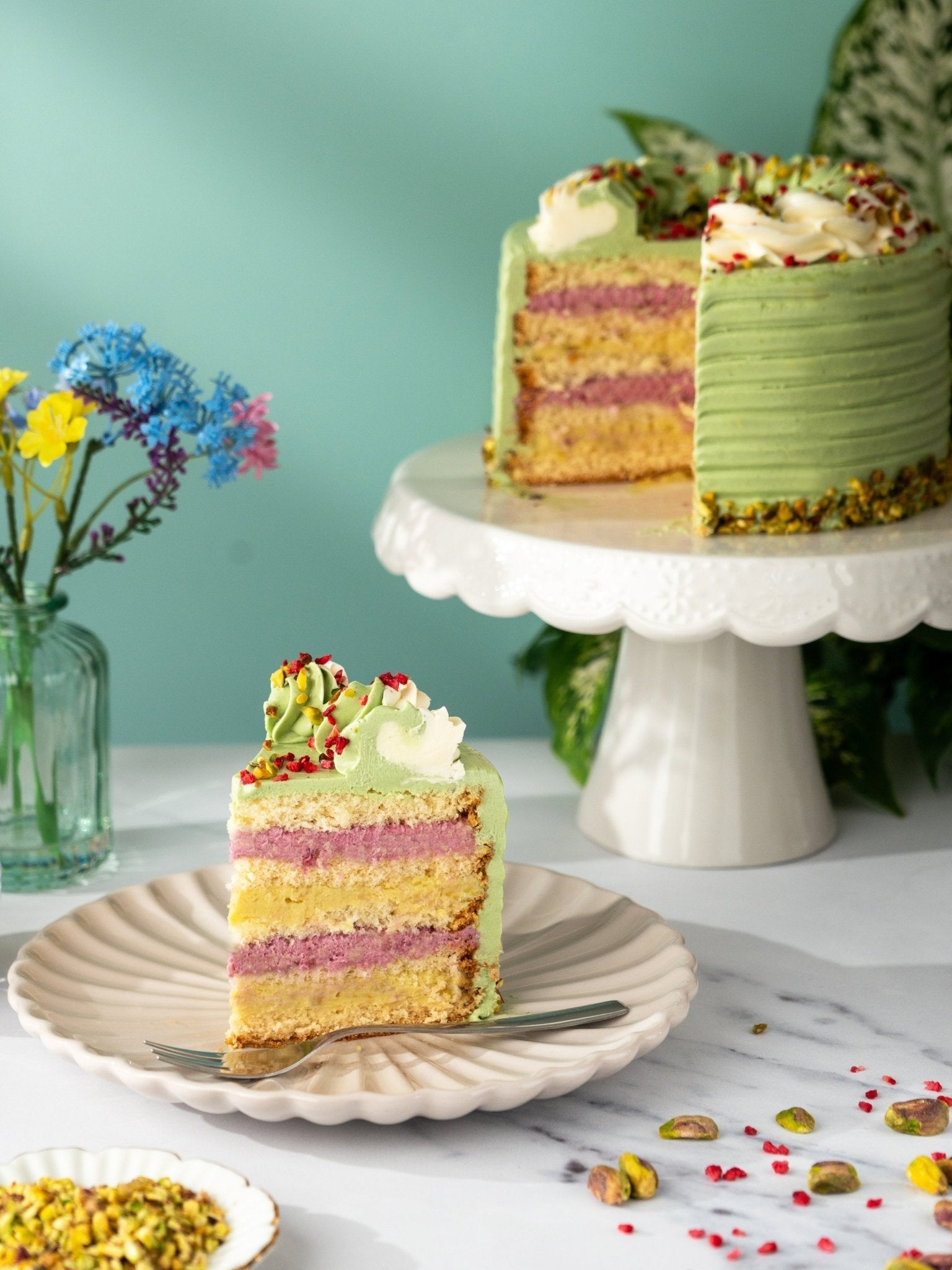 Patisserie Valerie Pistachio and Raspberry Delight Cake - Biscuiteers
