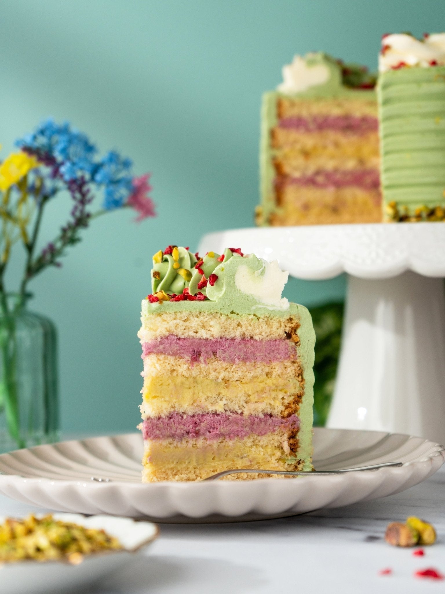 Patisserie Valerie Pistachio and Raspberry Delight Cake - Biscuiteers