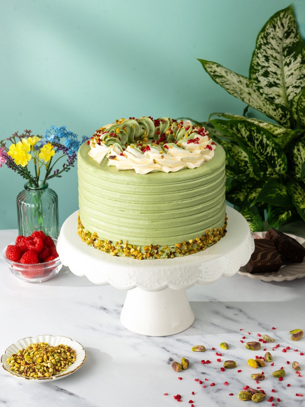 Patisserie Valerie Pistachio and Raspberry Delight Cake - Biscuiteers