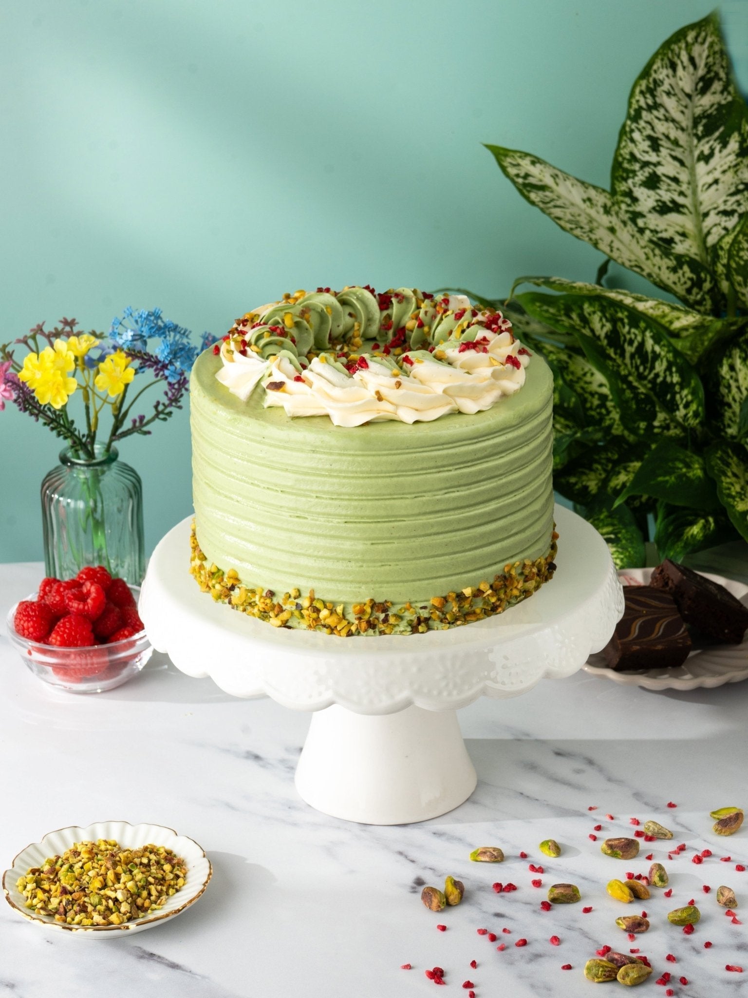 Patisserie Valerie Pistachio and Raspberry Delight Cake - Biscuiteers