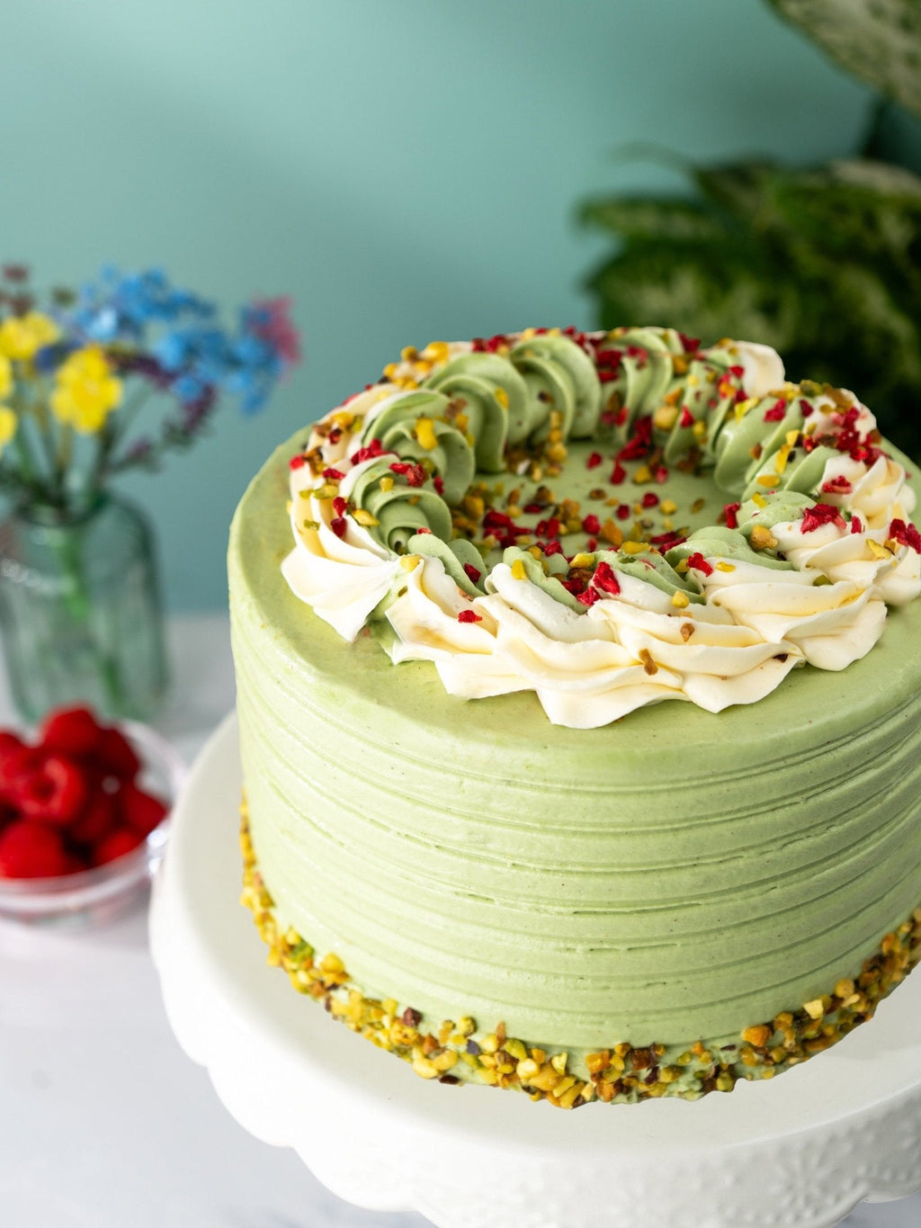 Patisserie Valerie Pistachio and Raspberry Delight Cake - Biscuiteers