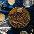 Starry Night Christmas Brownies - Biscuiteers